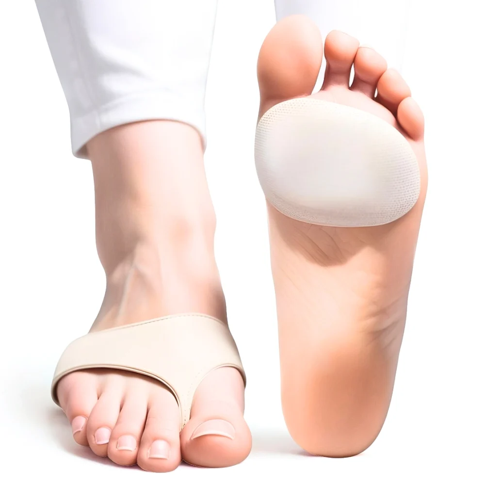 A pair of cushioned pads designed for Morton’s Neuroma support is shown on a woman’s foot against a plain white background. The soft gel cushion rests beneath the forefoot, providing shock absorption and reducing pressure on the metatarsal area. A contoured metatarsal bar lifts and separates the toes, aligning the bones to alleviate nerve compression. Breathable fabric wraps around the foot, securing the pad in place while moisture-wicking materials ensure comfort. The slim, low-profile design integrates discreetly with footwear, offering targeted relief for ball-of-foot discomfort. Reinforced edges prevent shifting during movement, maintaining consistent support throughout the day.