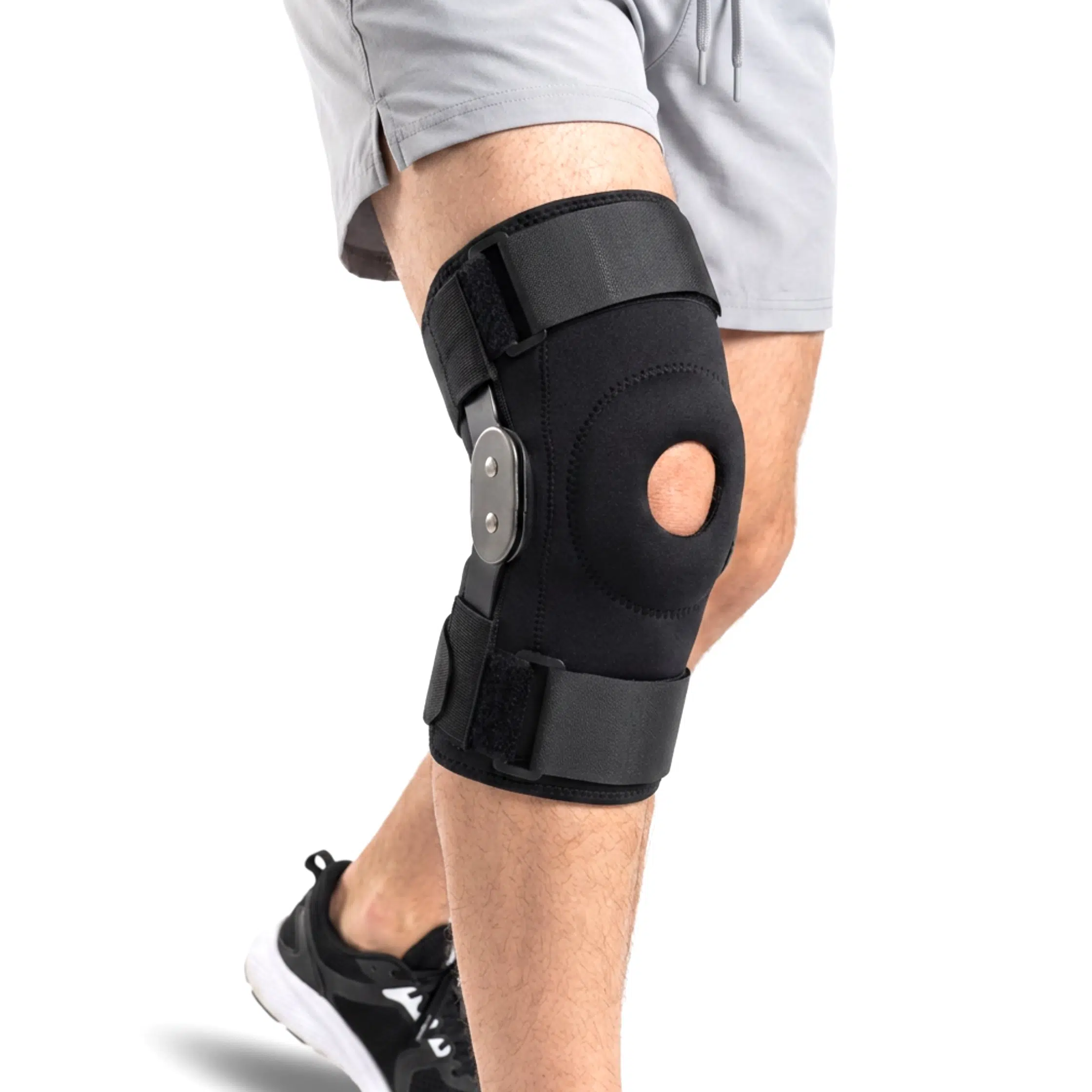 medical hinged knee brace being worn by man