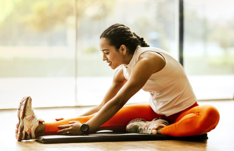 Women stretching a tight Achilles tendon