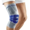 The main product image of our Knee compression support sleeve in colour grey and blue on a mans knee